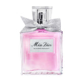 Miss Dior Blooming Bouquet EDT 100ml perfume bottle with pink fragrance and silver bow, ideal for women seeking a romantic floral scent.