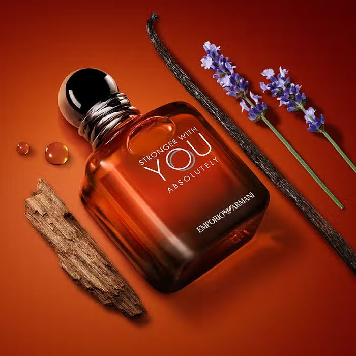 Front packshot of Emporio Armani Stronger With You Absolutely Parfum for Men in a rounded square clear glass bottle with amber fragrance and a glossy dark metallic cap