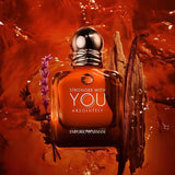 Front packshot of Emporio Armani Stronger With You Absolutely Parfum for Men in a rounded square clear glass bottle with amber fragrance and a glossy dark metallic cap