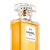 Close-up of Chanel N°5 Eau de Parfum 100ml highlighting the iconic crystal-cut cap and refined label, ideal for luxury fragrance collections.