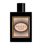 Gucci Bloom Eau de Parfum Intense 100ml in sleek black bottle with radiant floral label, ideal for women seeking sensual white floral elegance.
