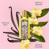 Gucci Flora Gorgeous Orchid Eau de Parfum 100ml with vanilla orchid, ozonic accord, and vanilla duo notes on pink background.
