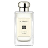 Jo Malone Grapefruit Cologne 100ml bottle with sleek transparent glass and silver cap, showcasing a minimalist luxury perfume design.